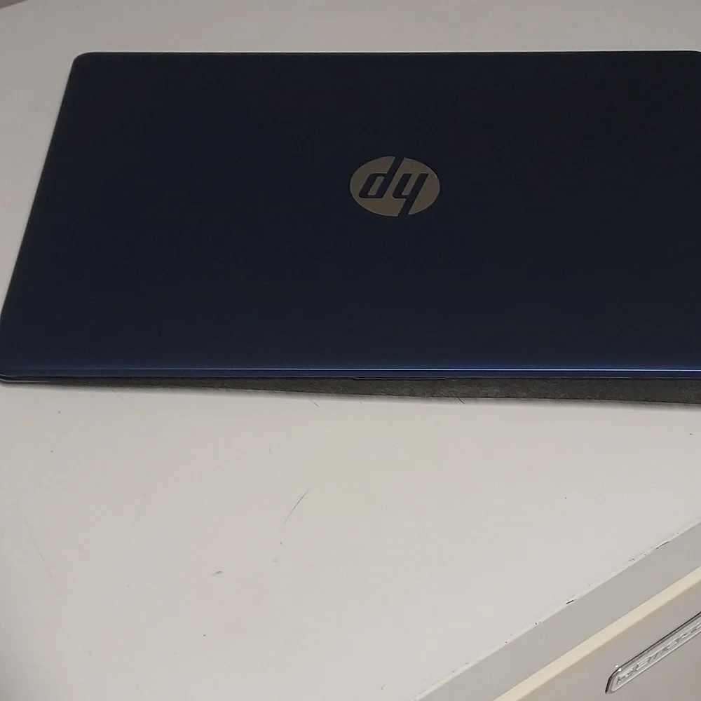 Blue Laptop with Black Cover